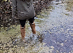 Pollinisuedeoverkneebootsintheriver