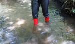 004.Redwellingtonbootsintheriver