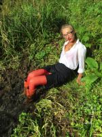 Secretary_in_water_and_mud_photoset