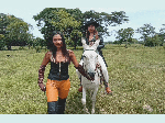 Michelle_and_Thalia_duo_on_donkey